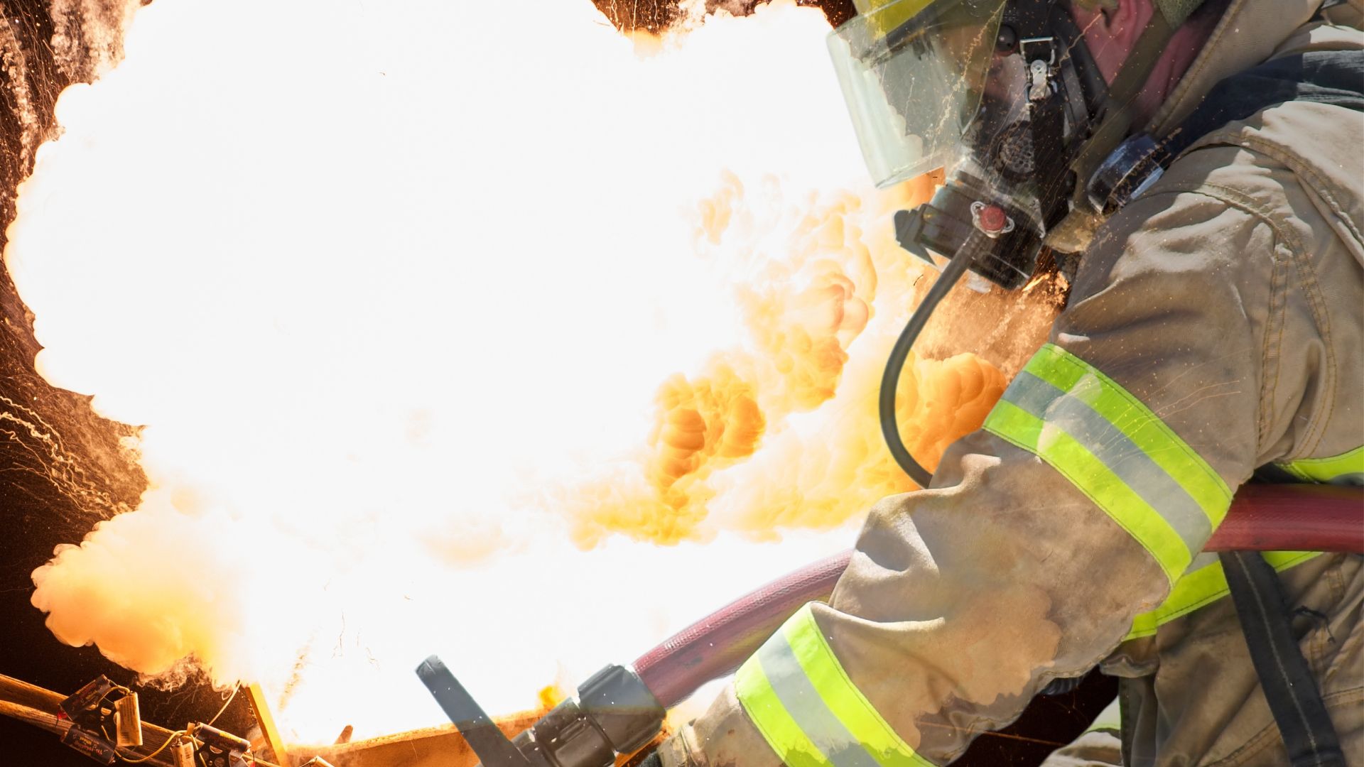 Firefighters dealing with explosions